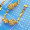 Picture of Flat Curb Chain Bracelet Gold Plated with CZ Spiral Balls Charms